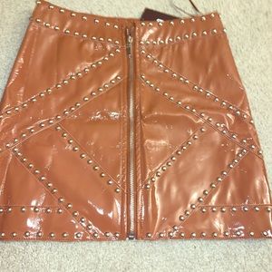 Patent leather studded skirt